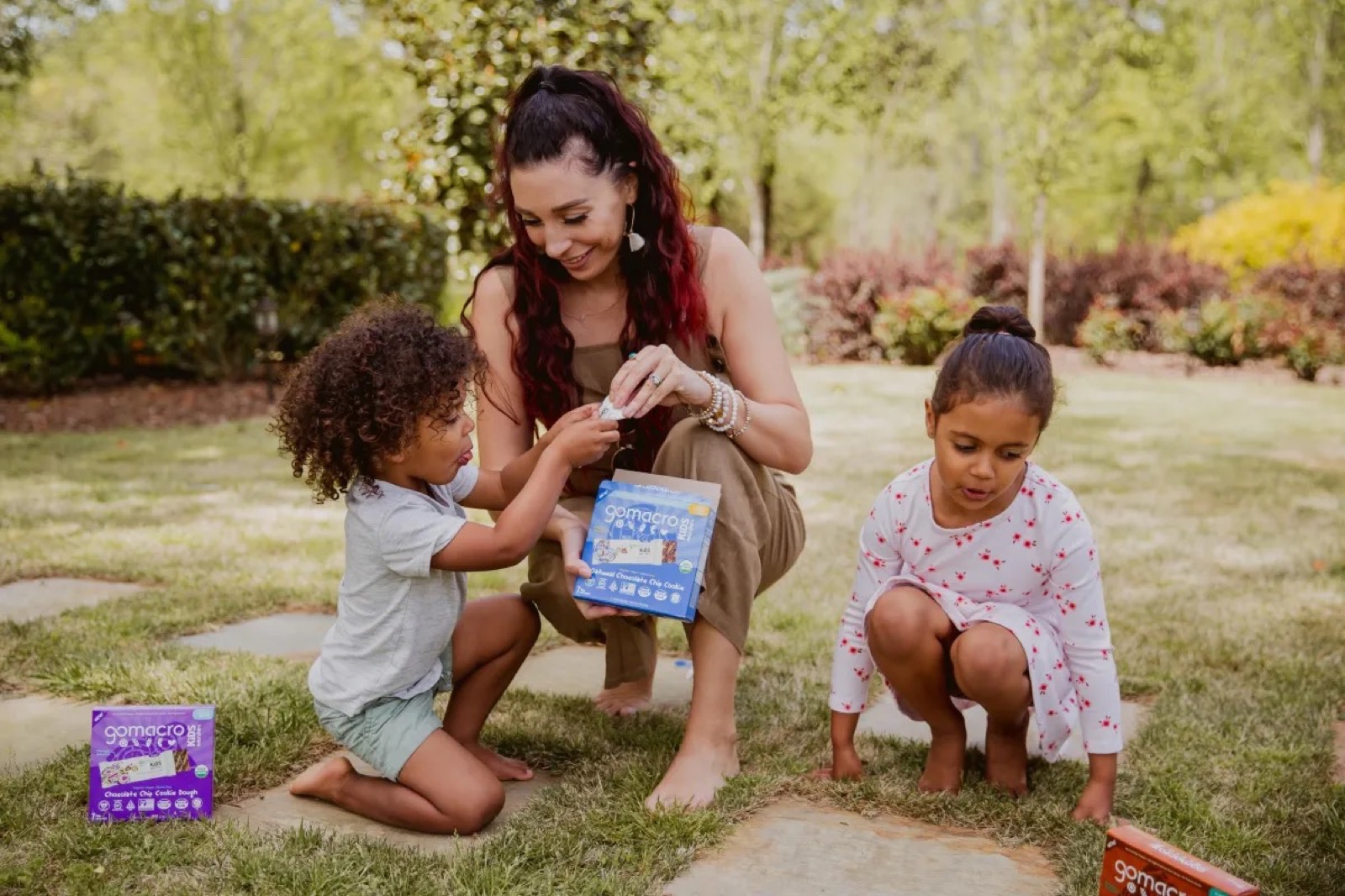 Mother and children outdoors